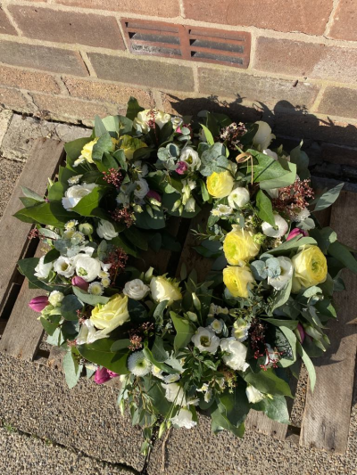 Eco Friendly Funeral Wreath - Made exclusively using all bio-degradable materials, which are plastic-free and kinder to the planet.

We can make your bespoke tribute in a choice of three sizes and any preferred colours. Please note any special requests in the comments section if ordering online.

Made on a mossed base100% recyclable.